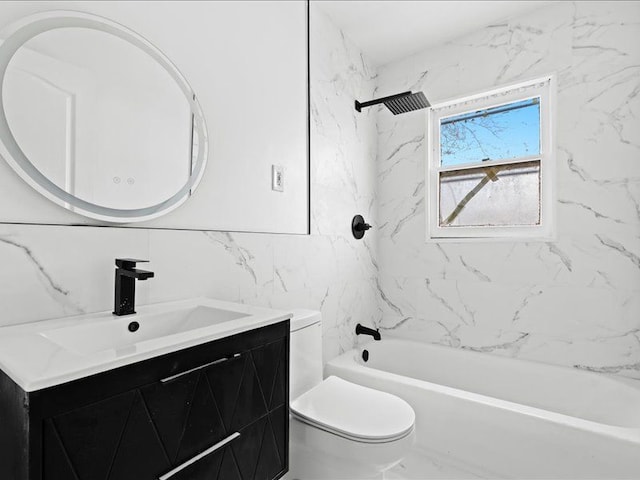 full bathroom featuring tiled shower / bath, vanity, toilet, and tile walls