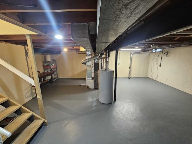 basement with heating unit and gas water heater