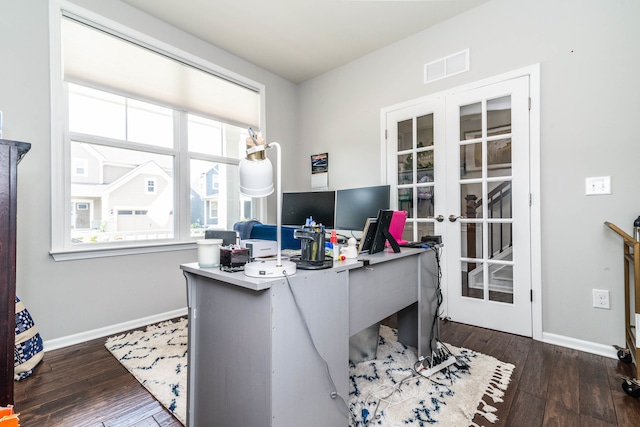 office space with dark hardwood / wood-style floors and french doors