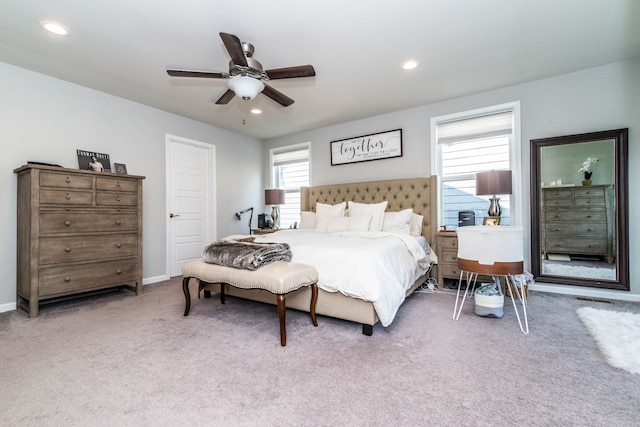 carpeted bedroom with ceiling fan