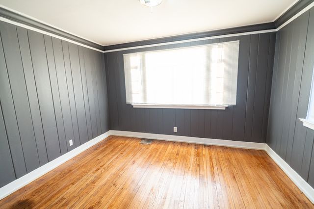 empty room with light hardwood / wood-style floors