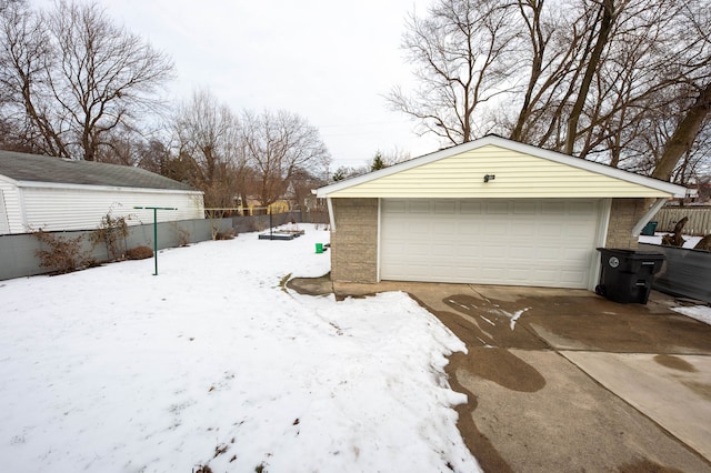 view of snow covered garage