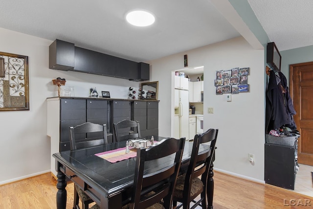 dining room featuring light wood-type flooring