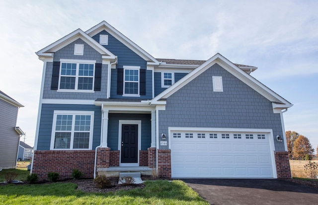 craftsman-style house featuring a garage