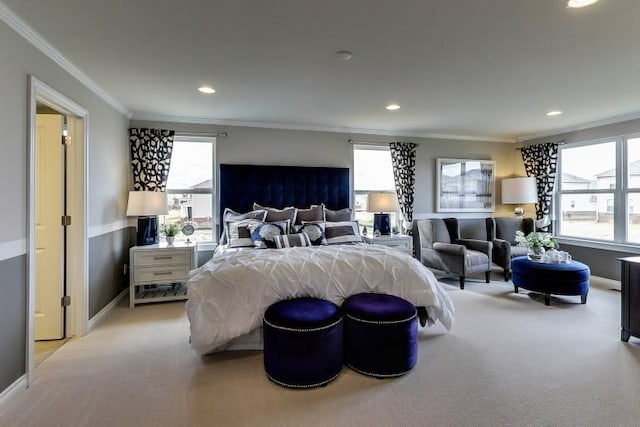 bedroom with light colored carpet and ornamental molding