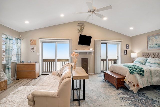 bedroom featuring ceiling fan, lofted ceiling, access to exterior, and light hardwood / wood-style flooring