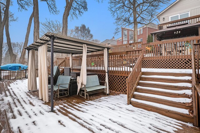 view of snow covered deck