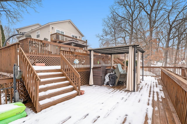 view of snow covered deck