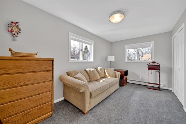 living area with baseboards, carpet, and a baseboard radiator