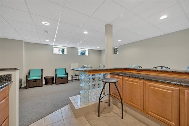 bar with light tile patterned floors, recessed lighting, visible vents, and light carpet