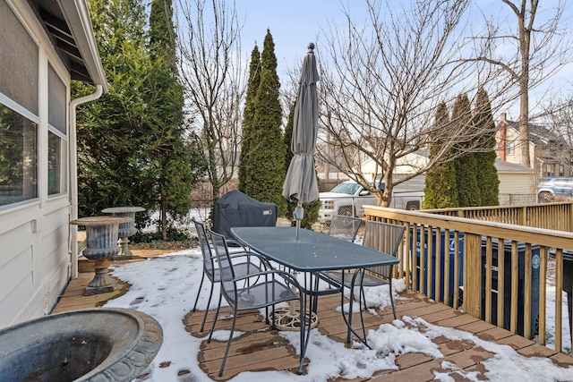 view of snow covered deck