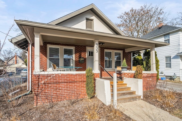 bungalow-style house featuring covered porch