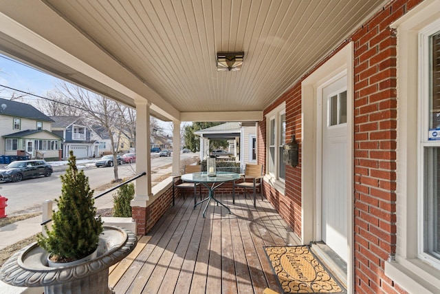 wooden deck with a porch