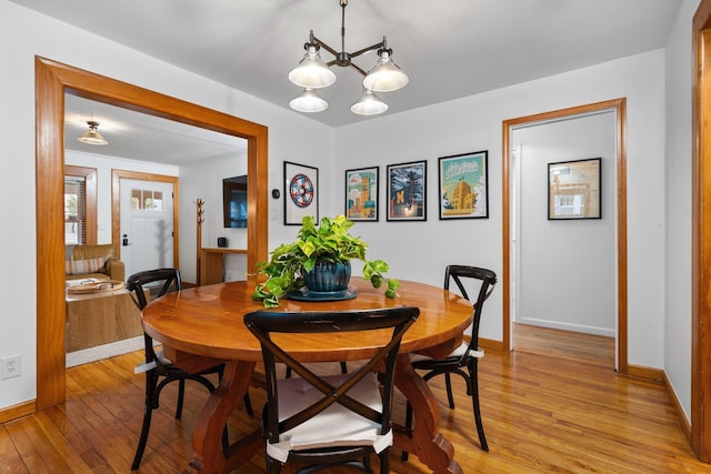 dining space featuring light hardwood / wood-style flooring