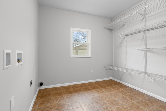 laundry area with tile patterned floors and washer hookup