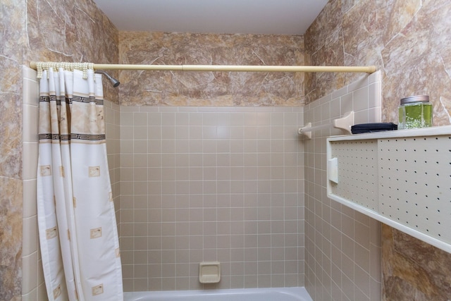 full bath with shower / bath combination with curtain