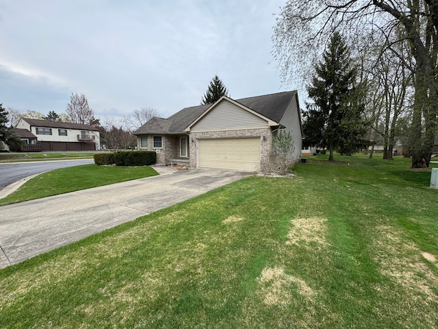 single story home featuring concrete driveway, a garage, a front lawn, and brick siding