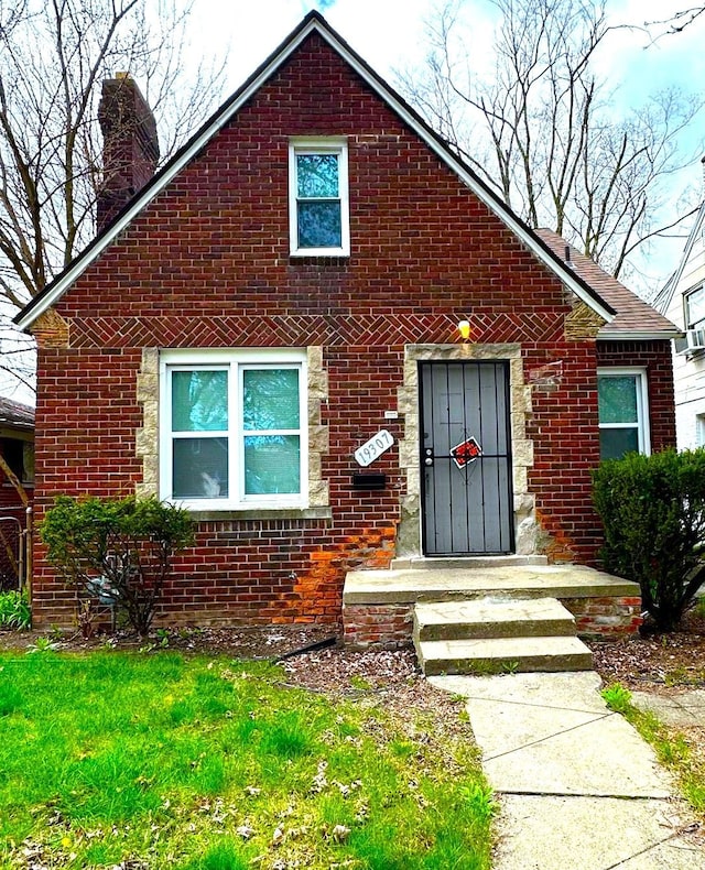 19307 Mansfield St, Detroit, MI 48235 - bungalow-style house with brick siding and a chimney
