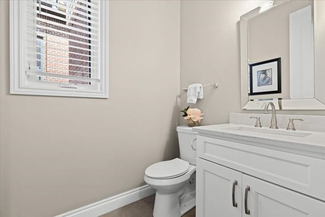 bathroom with vanity and toilet