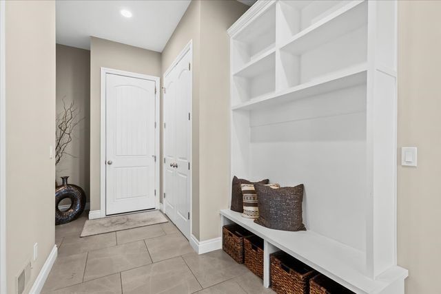 mudroom featuring light tile patterned flooring