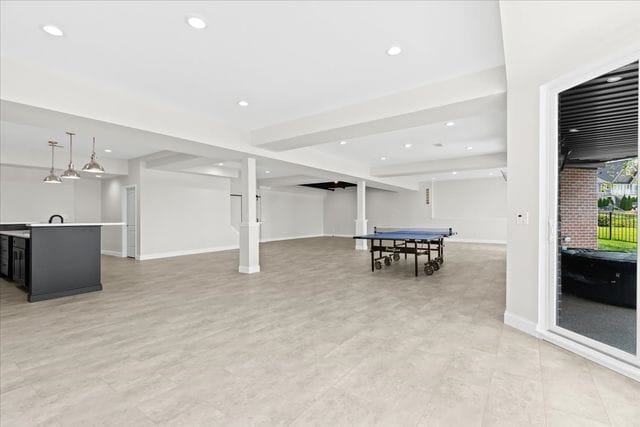 recreation room featuring indoor bar