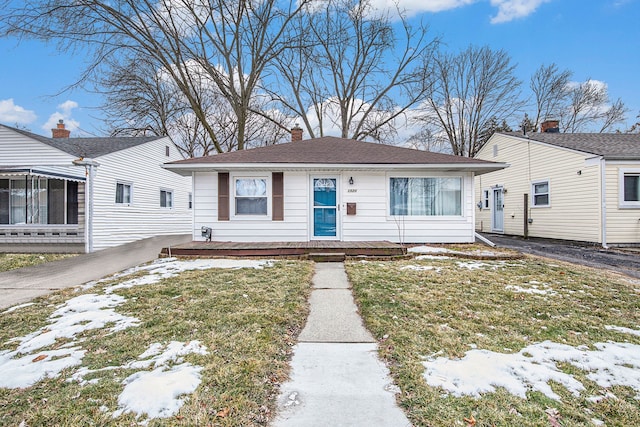 view of front of home with a yard