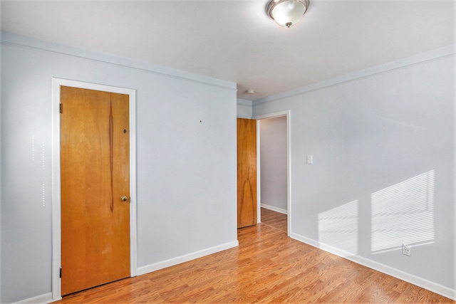 unfurnished room featuring light wood-type flooring