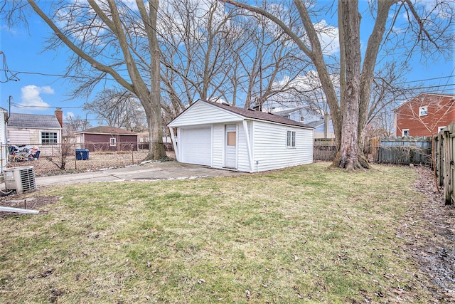 view of yard with a garage and an outdoor structure