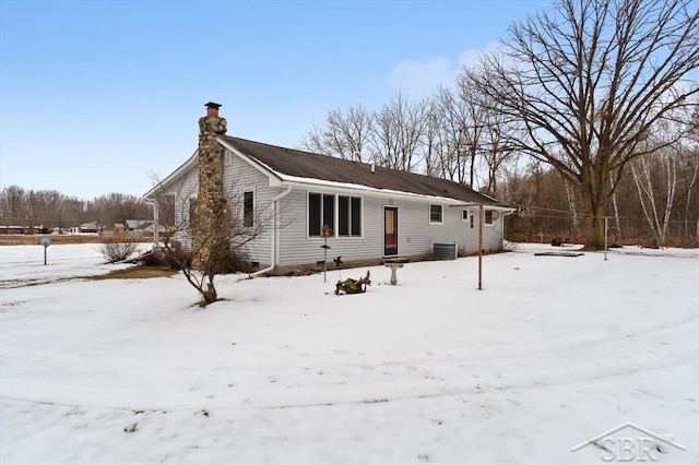 single story home featuring central AC unit