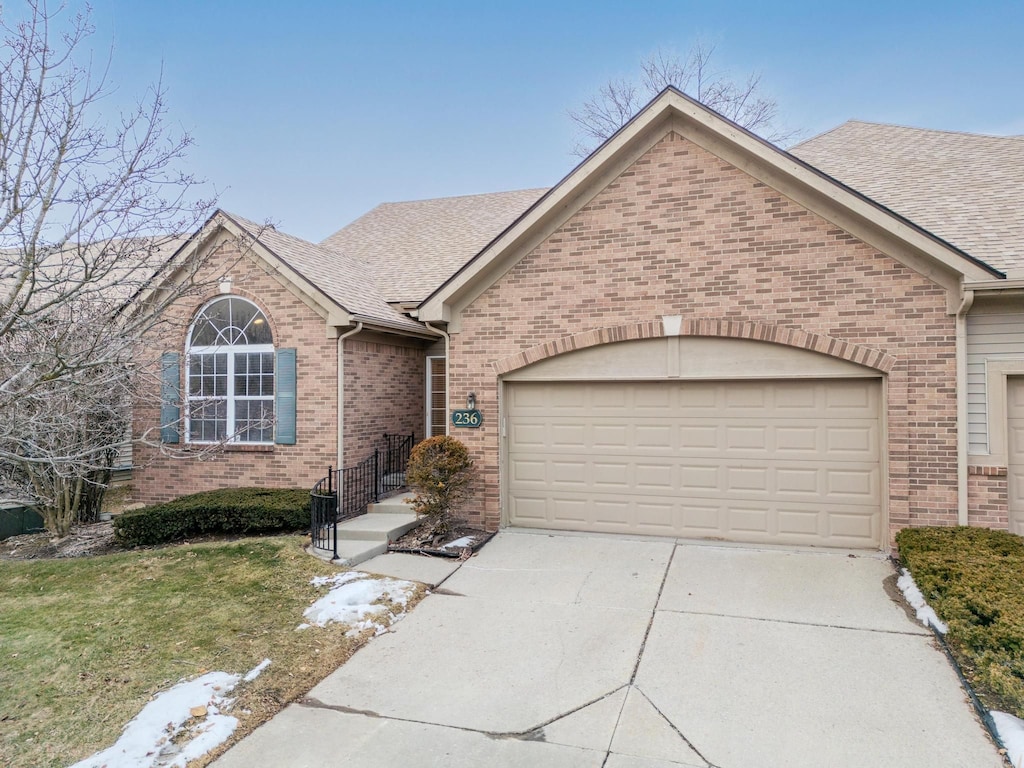 view of front of property featuring a garage