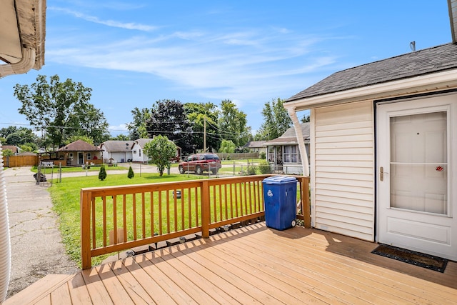 deck featuring a lawn