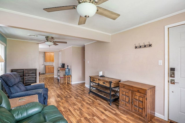 living room featuring crown molding and wood-type flooring