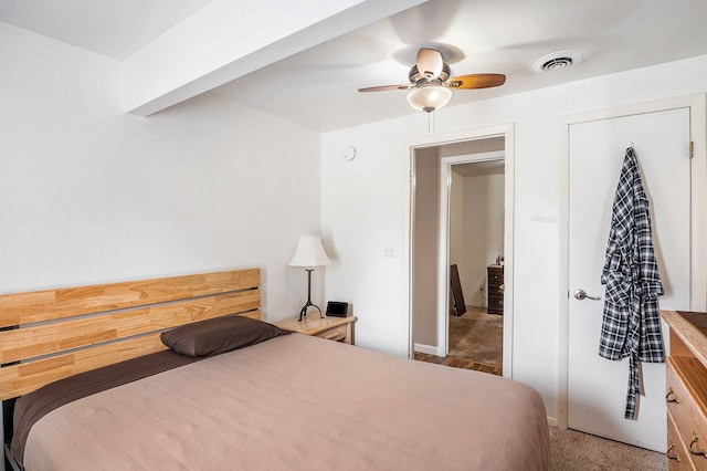 carpeted bedroom featuring ceiling fan