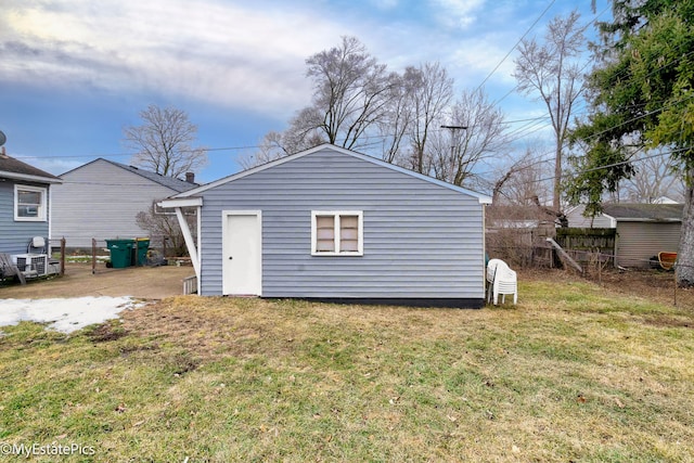 rear view of house with a yard