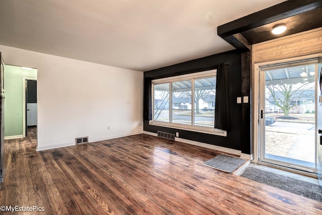 entrance foyer featuring dark hardwood / wood-style flooring