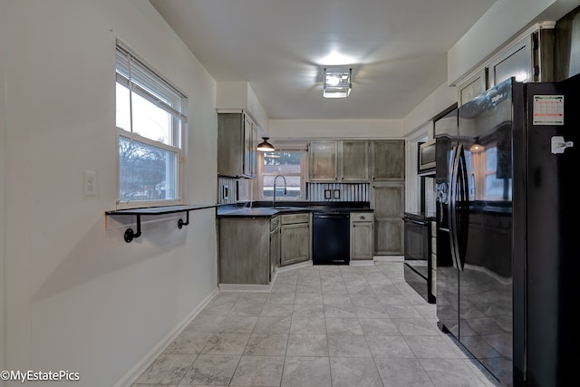 kitchen with sink, light tile patterned floors, and black appliances