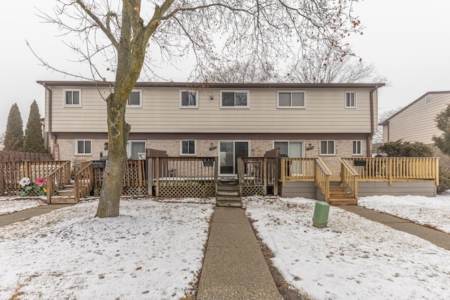 view of front of home with a deck