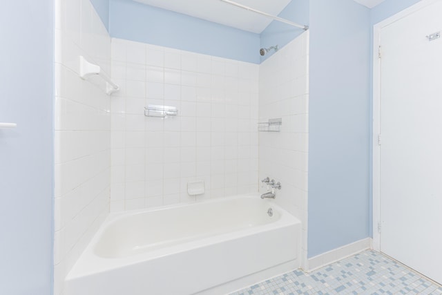 bathroom featuring tiled shower / bath combo