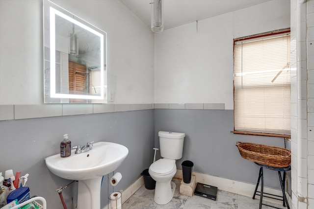 bathroom with sink and toilet