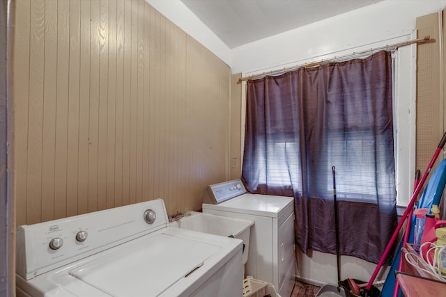 washroom with independent washer and dryer