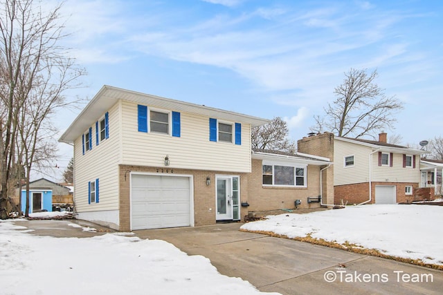 split level home with a garage