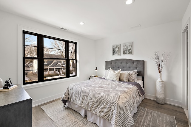 bedroom featuring hardwood / wood-style floors