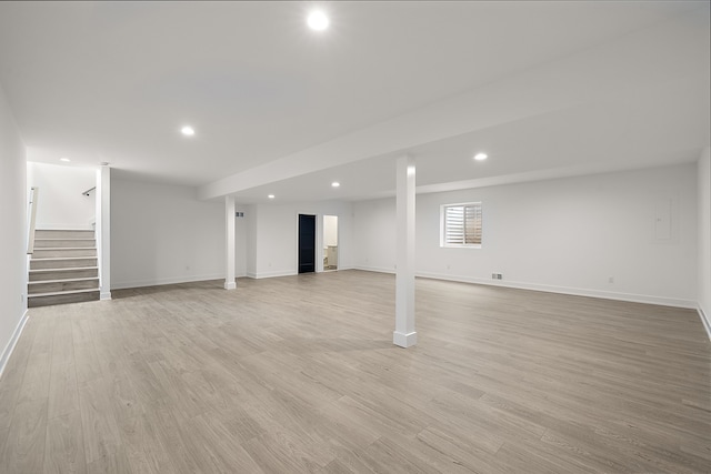 basement with light wood-type flooring