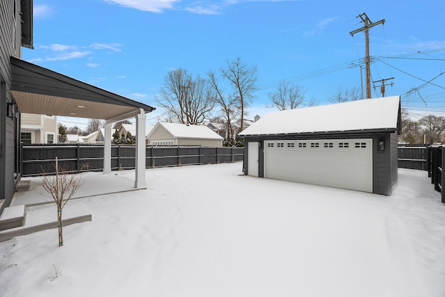 exterior space featuring an outbuilding and a garage