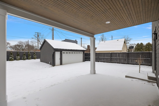 view of snow covered garage