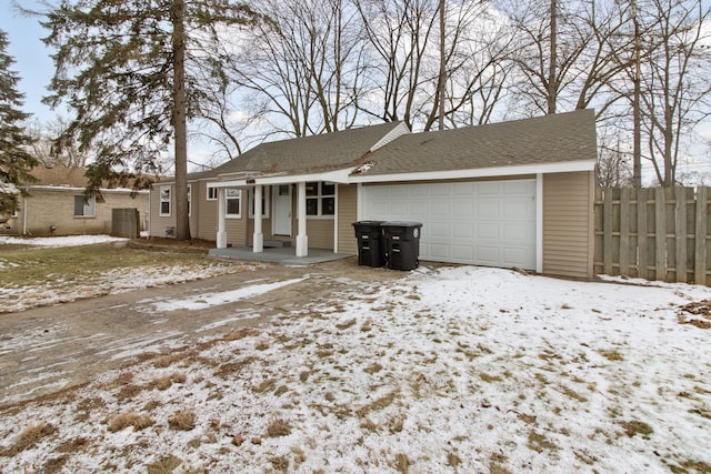 view of front of property with a garage