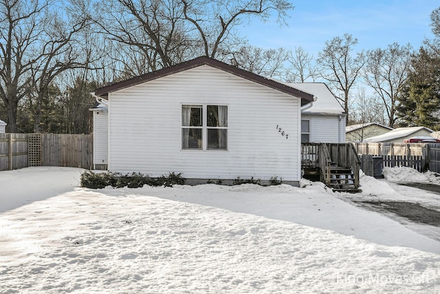 view of snow covered house