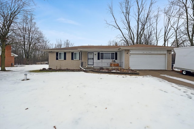 single story home with a garage