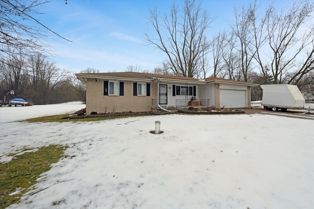 single story home featuring a garage