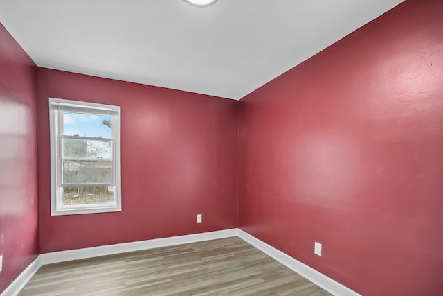 unfurnished room featuring light wood-type flooring